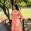 orange floral print design kurta set