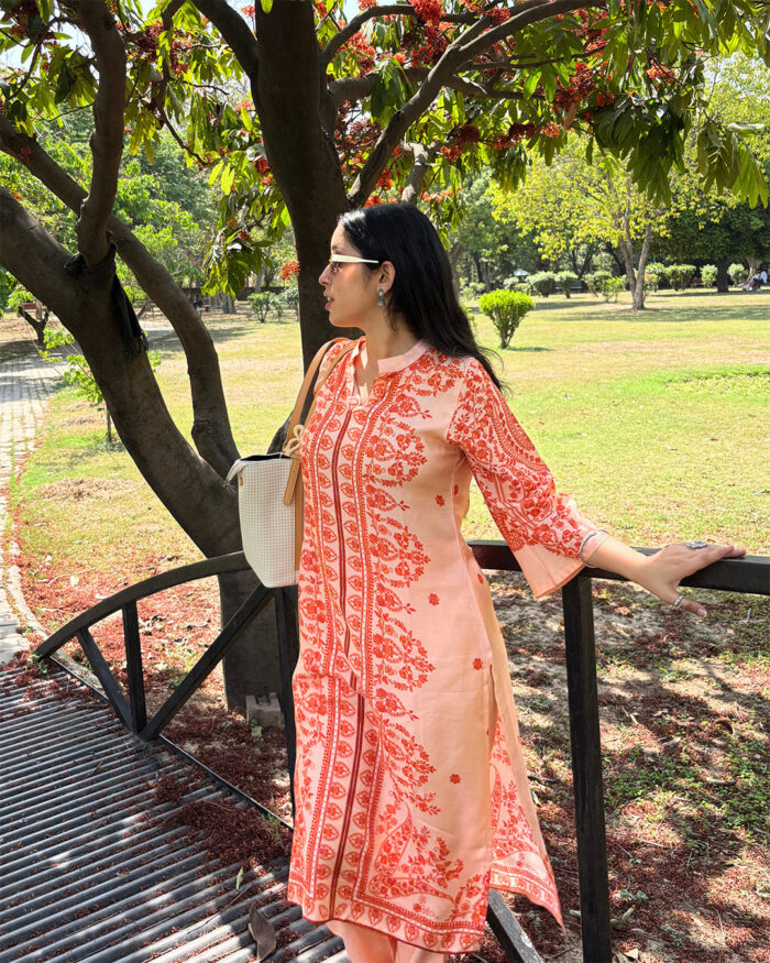 orange floral print design kurta set