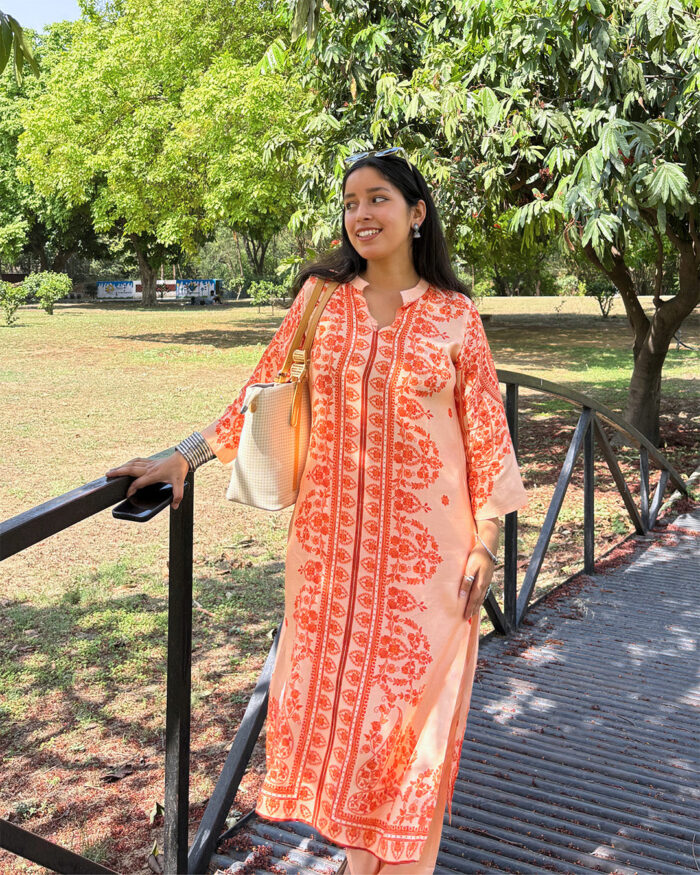 orange floral print design kurta set
