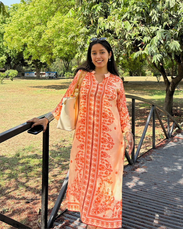 orange floral print design kurta set