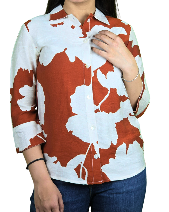 women white with orange print shirt trooking